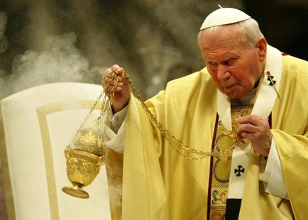 Pope John Paul II blesses the altar with burning incense during the New Year mass inside Saint Peters Basilica at the Vatican January 1, 200 Pope John Paul II blesses the altar with burning incense during the New Year mass inside Saint Peters Basilica at the Vatican January 1, 200
