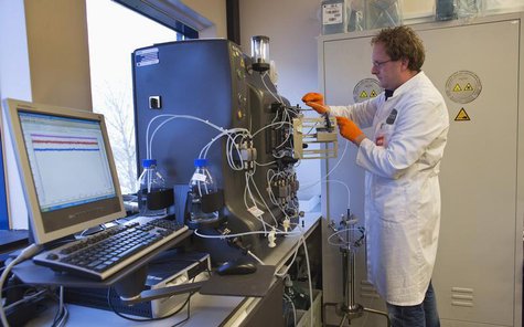 An operator installs a chromatography column to purify the gene therapy drug Glybera at Dutch biotech company uniQure in Amsterdam December An operator installs a chromatography column to purify the gene therapy drug Glybera at Dutch biotech company uniQure in Amsterdam December