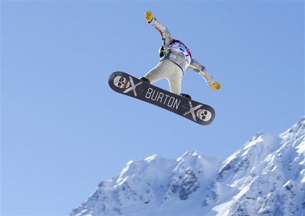 U.S. snowboarder Shaun White takes some air off a jump during a slopestyle snowboard training at the 2014 Sochi Winter Olympics in Rosa Khut U.S. snowboarder Shaun White takes some air off a jump during a slopestyle snowboard training at the 2014 Sochi Winter Olympics in Rosa Khut