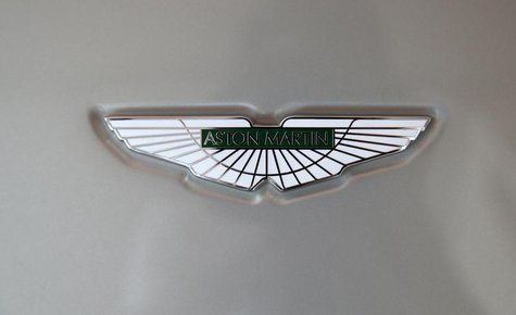 An Aston Martin logo is seen on a car inside the company's showroom in Doha October 19, 2013. REUTERS/Fadi Al-Assaad An Aston Martin logo is seen on a car inside the company's showroom in Doha October 19, 2013. REUTERS/Fadi Al-Assaad
