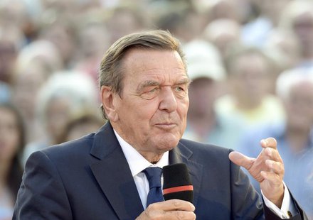 Former German Chancellor Gerhard Schroeder delivers his speech as he supports Social Democratic top candidate Peer Steinbrueck (SPD) (not pi Former German Chancellor Gerhard Schroeder delivers his speech as he supports Social Democratic top candidate Peer Steinbrueck (SPD) (not pi