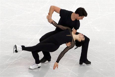 Tessa Virtue and Scott Moir of Canada skate during an ice dance figure skating training session at the Iceberg Skating Palace in preparation Tessa Virtue and Scott Moir of Canada skate during an ice dance figure skating training session at the Iceberg Skating Palace in preparation