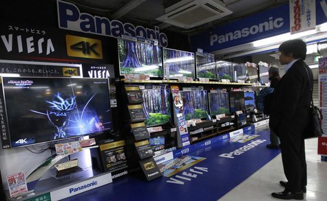 A shopper looks at Panasonic Corp's Viera televisions displayed at an electronics retail store in Tokyo February 3, 2014. REUTERS/Yuya Shino A shopper looks at Panasonic Corp's Viera televisions displayed at an electronics retail store in Tokyo February 3, 2014. REUTERS/Yuya Shino