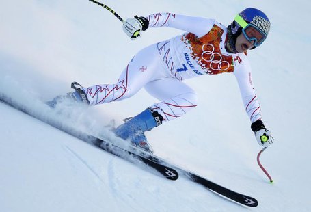 Laurenne Ross of the U.S. speeds down the course during the first training session for the women's alpine skiing downhill event at the 2014 Laurenne Ross of the U.S. speeds down the course during the first training session for the women's alpine skiing downhill event at the 2014