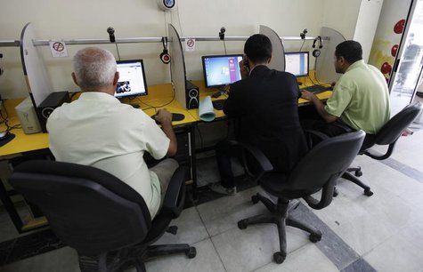 People surf the Internet at an Internet cafe in Baghdad November 11, 2012. REUTERS/Mohammed Ameen People surf the Internet at an Internet cafe in Baghdad November 11, 2012. REUTERS/Mohammed Ameen