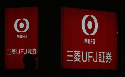 A pedestrian walks past a logo of Mitsubishi UFJ Securities in Tokyo February 3, 2009. REUTERS/Yuriko Nakao A pedestrian walks past a logo of Mitsubishi UFJ Securities in Tokyo February 3, 2009. REUTERS/Yuriko Nakao