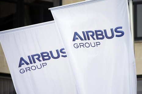 Flags with the new logo of aircraft manufacturer Airbus Group are seen on the entrance gate of the company's office building in Paris Januar Flags with the new logo of aircraft manufacturer Airbus Group are seen on the entrance gate of the company's office building in Paris Januar