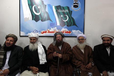 Maulana Sami ul-Haq (C), one of the Taliban negotiators, flanked by his team members Ibrahim Khan (2nd L) and Maulana Abdul Aziz (2nd R), ge Maulana Sami ul-Haq (C), one of the Taliban negotiators, flanked by his team members Ibrahim Khan (2nd L) and Maulana Abdul Aziz (2nd R), ge