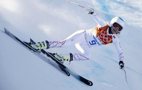 Julia Mancuso of the U.S. speeds down the course in the first training session for the women's alpine skiing downhill event during the 2014 Julia Mancuso of the U.S. speeds down the course in the first training session for the women's alpine skiing downhill event during the 2014
