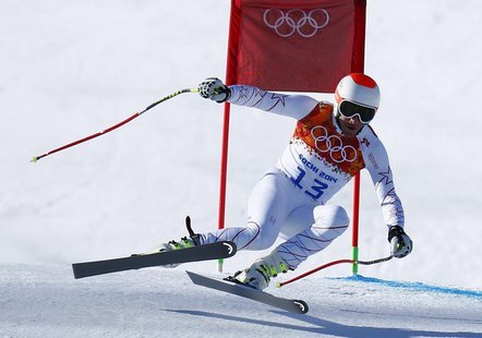 Bode Miller of the U.S. speeds down the course in the first training session for the men's alpine skiing downhill event during the 2014 Soch Bode Miller of the U.S. speeds down the course in the first training session for the men's alpine skiing downhill event during the 2014 Soch