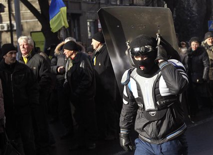 Anti-government protesters march on the street in Kiev February 6, 2014. REUTERS/Valentyn Ogirenko Anti-government protesters march on the street in Kiev February 6, 2014. REUTERS/Valentyn Ogirenko