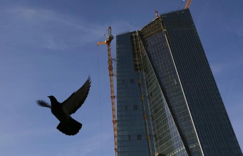 A pigeon flies next to the construction site of the new European Central Bank (ECB) headquarters in Frankfurt, December 3, 2013. REUTERS/Kai A pigeon flies next to the construction site of the new European Central Bank (ECB) headquarters in Frankfurt, December 3, 2013. REUTERS/Kai
