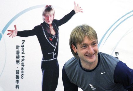 Former Olympic champion figure skater Yevgeny Plushenko of Russia smiles as he leaves a news conference in Beijing September 3, 2010 file ph Former Olympic champion figure skater Yevgeny Plushenko of Russia smiles as he leaves a news conference in Beijing September 3, 2010 file ph