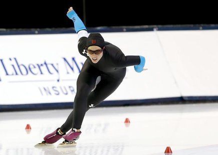 Dec 29, 2013; Kearns, UT, USA; Kelli Gunther competes in the 1000m during the U.S. Olympic speedskating trials at Utah Olympic Oval. Mandato Dec 29, 2013; Kearns, UT, USA; Kelli Gunther competes in the 1000m during the U.S. Olympic speedskating trials at Utah Olympic Oval. Mandato