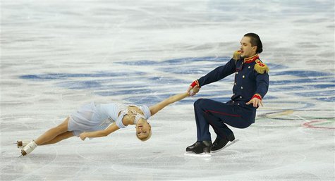 Tatiana Volosozhar and Maxim Trankov of Russia compete during the Team Pairs Short Program at the Sochi 2014 Winter Olympics, February 6, 20 Tatiana Volosozhar and Maxim Trankov of Russia compete during the Team Pairs Short Program at the Sochi 2014 Winter Olympics, February 6, 20