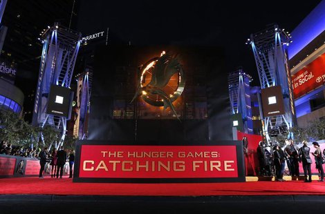 People wait at the premiere of "The Hunger Games: Catching Fire" in Los Angeles, California November 18, 2013. REUTERS/Mario Anzuoni People wait at the premiere of "The Hunger Games: Catching Fire" in Los Angeles, California November 18, 2013. REUTERS/Mario Anzuoni