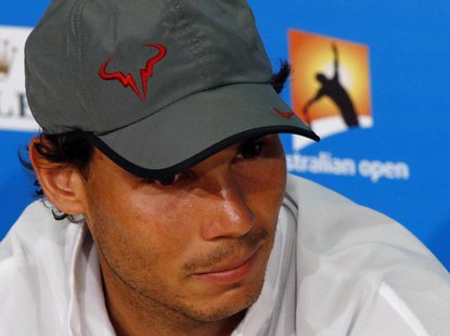 Rafael Nadal of Spain attends a news conference after losing his men's singles final match against Stanislas Wawrinka of Switzerland at the Rafael Nadal of Spain attends a news conference after losing his men's singles final match against Stanislas Wawrinka of Switzerland at the