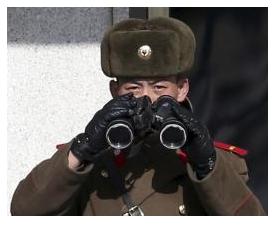 A North Korean soldier, with a pair of binoculars, observes activity in the south of the truce village of Panmunjom in the demilitarised zone separating the two Koreas, north of Seoul February 6, More...
CREDIT: REUTERS/HAN JAE-HO/NEWS1 A North Korean soldier, with a pair of binoculars, observes activity in the south of the truce village of Panmunjom in the demilitarised zone separating the two Koreas, north of Seoul February 6, More...
CREDIT: REUTERS/HAN JAE-HO/NEWS1