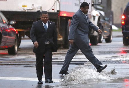 Trenton New Jersey Mayor Tony Mack (left) and his brother Ralphiel Mack (right) arrive at United States Court in Trenton, New Jersey, Januar Trenton New Jersey Mayor Tony Mack (left) and his brother Ralphiel Mack (right) arrive at United States Court in Trenton, New Jersey, Januar