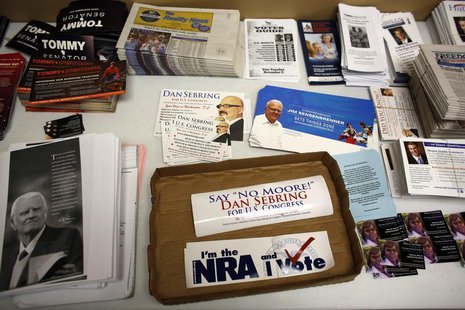 The Republican party information table is seen at a Romney/Ryan office as volunteers get in their last efforts the day before election day i The Republican party information table is seen at a Romney/Ryan office as volunteers get in their last efforts the day before election day i