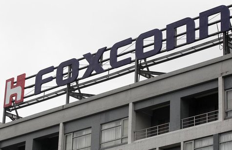 The logo of Foxconn, the trading name of Hon Hai Precision Industry, is seen on top of the company's headquarters in Tucheng, New Taipei cit The logo of Foxconn, the trading name of Hon Hai Precision Industry, is seen on top of the company's headquarters in Tucheng, New Taipei cit