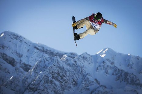U.S. snowboarder Shaun White goes off a jump during snowboard slopestyle training at the 2014 Sochi Winter Olympics in Rosa Khutor February U.S. snowboarder Shaun White goes off a jump during snowboard slopestyle training at the 2014 Sochi Winter Olympics in Rosa Khutor February