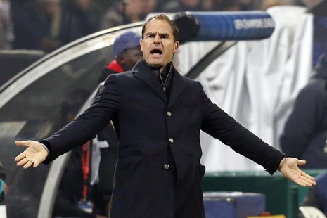 Ajax Amsterdam's coach Frank De Boer reacts during their Champions League group H soccer match against AC Milan at the San Siro stadium in M Ajax Amsterdam's coach Frank De Boer reacts during their Champions League group H soccer match against AC Milan at the San Siro stadium in M