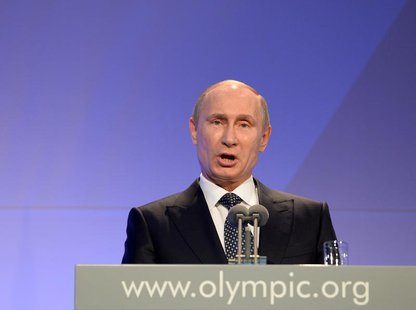 Russian President Vladimir Putin delivers his speech at the International Olympic Committee (IOC) Gala Dinner at the 2014 Sochi Winter Olymp Russian President Vladimir Putin delivers his speech at the International Olympic Committee (IOC) Gala Dinner at the 2014 Sochi Winter Olymp