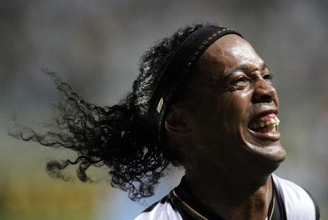 Ronaldinho of Brazil's Atletico Mineiro celebrates his second goal against Argentina's Arsenal during their Copa Libertadores soccer match i Ronaldinho of Brazil's Atletico Mineiro celebrates his second goal against Argentina's Arsenal during their Copa Libertadores soccer match i