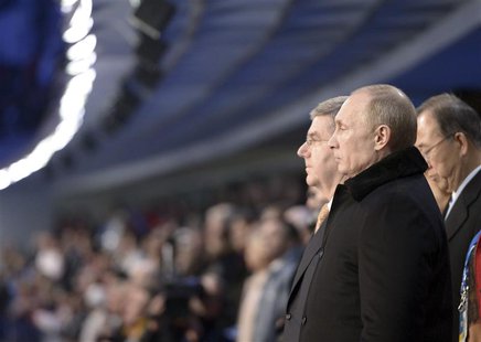 Russia's President Vladimir Putin (front) and International Olympic Committee (IOC) President Thomas Bach (L, back) attend the opening cerem Russia's President Vladimir Putin (front) and International Olympic Committee (IOC) President Thomas Bach (L, back) attend the opening cerem
