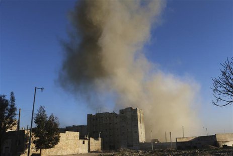 Smoke rises after what activists said was shelling by forces loyal to Syria's President Bashar al-Assad, in the al-Myassar neighbourhood of Smoke rises after what activists said was shelling by forces loyal to Syria's President Bashar al-Assad, in the al-Myassar neighbourhood of