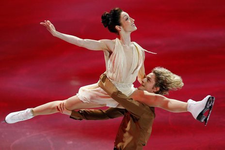 Ice dance gold medallists Meryl Davis and Charlie White (R) skate during an exhibition event at the conclusion of the U.S. Figure Skating Ch Ice dance gold medallists Meryl Davis and Charlie White (R) skate during an exhibition event at the conclusion of the U.S. Figure Skating Ch