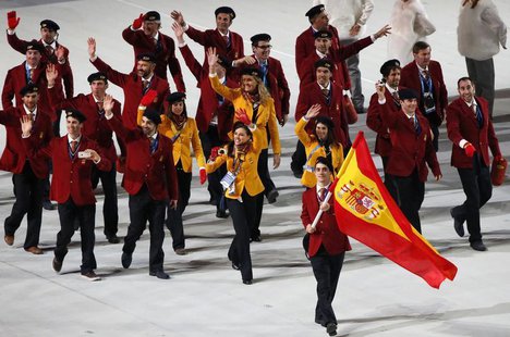 Spain's flag-bearer Javier Fernandez leads his country's contingent during the opening ceremony of the 2014 Sochi Winter Olympics, February Spain's flag-bearer Javier Fernandez leads his country's contingent during the opening ceremony of the 2014 Sochi Winter Olympics, February