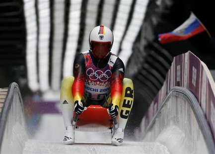Germany's Felix Loch speeds down the track during the men's singles luge competition at the 2014 Sochi Winter Olympics, at the Sanki Sliding Germany's Felix Loch speeds down the track during the men's singles luge competition at the 2014 Sochi Winter Olympics, at the Sanki Sliding