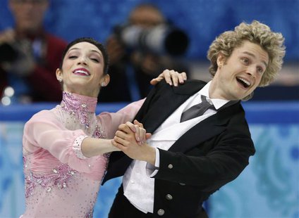 Meryl Davis (L) and Charlie White of the U.S. compete during the figure skating team ice dance short dance at the Sochi 2014 Winter Olympics Meryl Davis (L) and Charlie White of the U.S. compete during the figure skating team ice dance short dance at the Sochi 2014 Winter Olympics