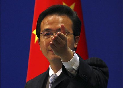 China's Foreign Ministry spokesman Hong Lei asks journalists for questions during a news conference in Beijing July 7, 2011. REUTERS/David G China's Foreign Ministry spokesman Hong Lei asks journalists for questions during a news conference in Beijing July 7, 2011. REUTERS/David G