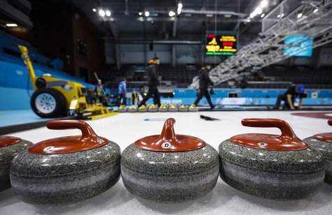 Workers set up the Ice Cube Curling Center as preparations continue for the 2014 Sochi Winter Olympics, February 5, 2014. REUTERS/Mark Blinc Workers set up the Ice Cube Curling Center as preparations continue for the 2014 Sochi Winter Olympics, February 5, 2014. REUTERS/Mark Blinc