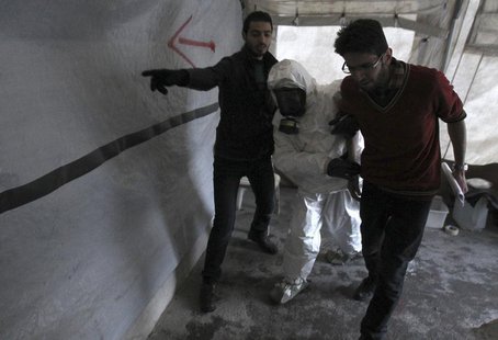 A Free Syrian Army medical group conducts a training on how to cope with chemical weapons attacks in Aleppo December 25, 2013. Picture taken A Free Syrian Army medical group conducts a training on how to cope with chemical weapons attacks in Aleppo December 25, 2013. Picture taken