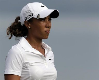Cheyenne Woods of the U.S. looks her approach shot onto the fifth green during the third round of the 18th Evian Masters golf tournament in Cheyenne Woods of the U.S. looks her approach shot onto the fifth green during the third round of the 18th Evian Masters golf tournament in