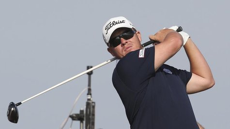 George Coetzee of South Africa tees his shot during the third round of the Qatar Masters in Doha, January 24, 2014. REUTERS/Fadi Al-Assaad George Coetzee of South Africa tees his shot during the third round of the Qatar Masters in Doha, January 24, 2014. REUTERS/Fadi Al-Assaad