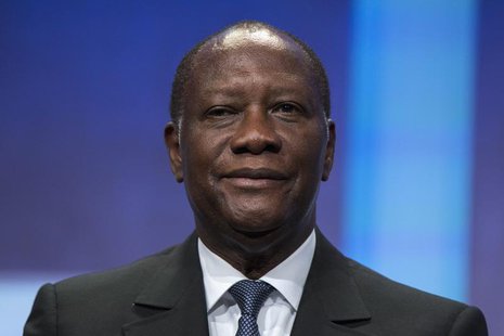 President of Ivory Coast Alassane Ouattara sits on stage in support of a commitment to stop poaching of African elephants announced at the C President of Ivory Coast Alassane Ouattara sits on stage in support of a commitment to stop poaching of African elephants announced at the C