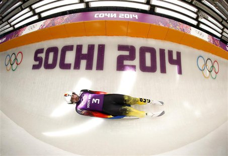 Germany's Andi Langenhan speeds down the track during a men luge training at the Sanki sliding center in Rosa Khutor, a venue for the 2014 S Germany's Andi Langenhan speeds down the track during a men luge training at the Sanki sliding center in Rosa Khutor, a venue for the 2014 S