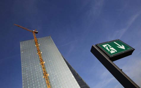The emergency exit sign of a restaurant is seen next to the construction site of the new European Central Bank (ECB) headquarters in Frankfu The emergency exit sign of a restaurant is seen next to the construction site of the new European Central Bank (ECB) headquarters in Frankfu