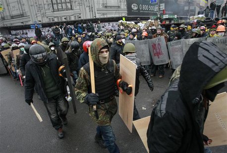 Anti-government protesters march on a street in central Kiev February 8, 2014. REUTERS/Gleb Garanich Anti-government protesters march on a street in central Kiev February 8, 2014. REUTERS/Gleb Garanich