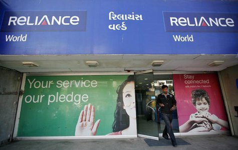 A customer leaves a Reliance communication store in the western Indian city of Ahmedabad January 23, 2013. REUTERS/Amit Dave A customer leaves a Reliance communication store in the western Indian city of Ahmedabad January 23, 2013. REUTERS/Amit Dave