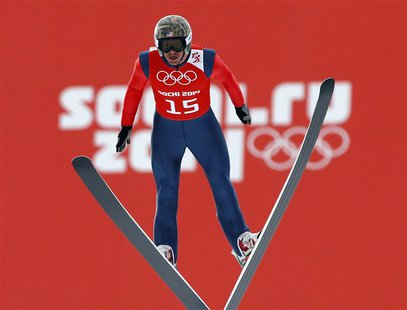 Todd Lodwick from the U.S. soars through the air during the training of the normal hill ski jumping portion of the Nordic Combined individua Todd Lodwick from the U.S. soars through the air during the training of the normal hill ski jumping portion of the Nordic Combined individua