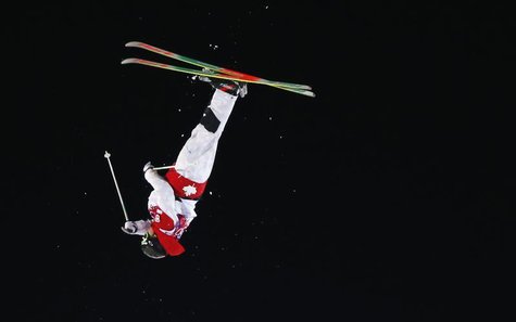 Canada's Alex Bilodeau performs a jump during the men's freestyle skiing moguls finals at the 2014 Sochi Winter Olympic Games in Rosa Khutor Canada's Alex Bilodeau performs a jump during the men's freestyle skiing moguls finals at the 2014 Sochi Winter Olympic Games in Rosa Khutor