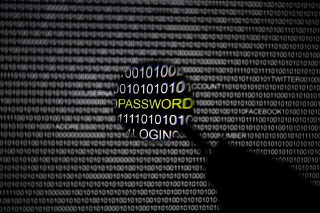 A magnifying glass is held in front of a computer screen in this picture illustration taken in Berlin May 21, 2013. REUTERS/Pawel Kopczynski A magnifying glass is held in front of a computer screen in this picture illustration taken in Berlin May 21, 2013. REUTERS/Pawel Kopczynski