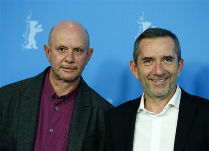 Director Pascal Chaumeil (R) and writer Nick Hornby pose during a photocall to promote the movie "A Long Way Down" at the 64th Berlinale Int Director Pascal Chaumeil (R) and writer Nick Hornby pose during a photocall to promote the movie "A Long Way Down" at the 64th Berlinale Int