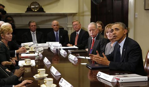U.S. President Barack Obama meets with health insurance chief executives at the White House in Washington November 15, 2013 file photo. REUT U.S. President Barack Obama meets with health insurance chief executives at the White House in Washington November 15, 2013 file photo. REUT